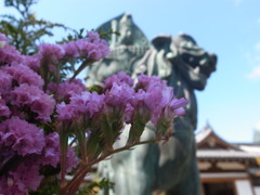 仏像と花