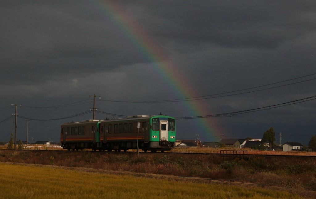 虹と電車君