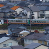 家並み通過中