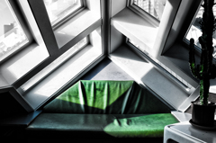 Comfortable sofa under the slant roof