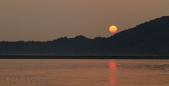 ボタンみたいな夕日