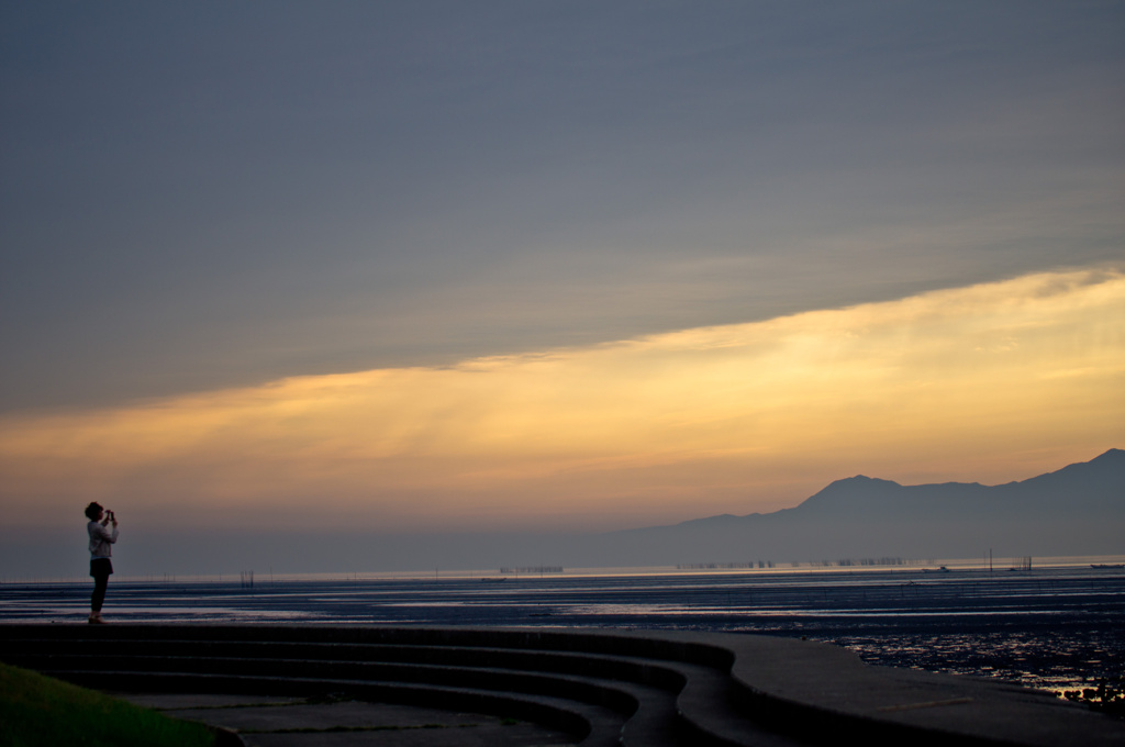 夕焼けを撮る　ひと