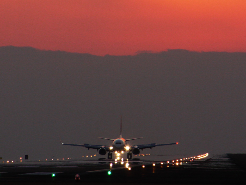 夕焼けと飛行機