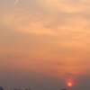 夕陽と飛行機雲・・・