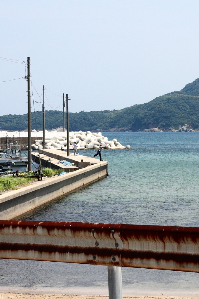 夏の釣り人