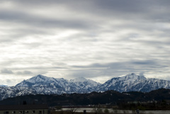 越後三山雪消え模様