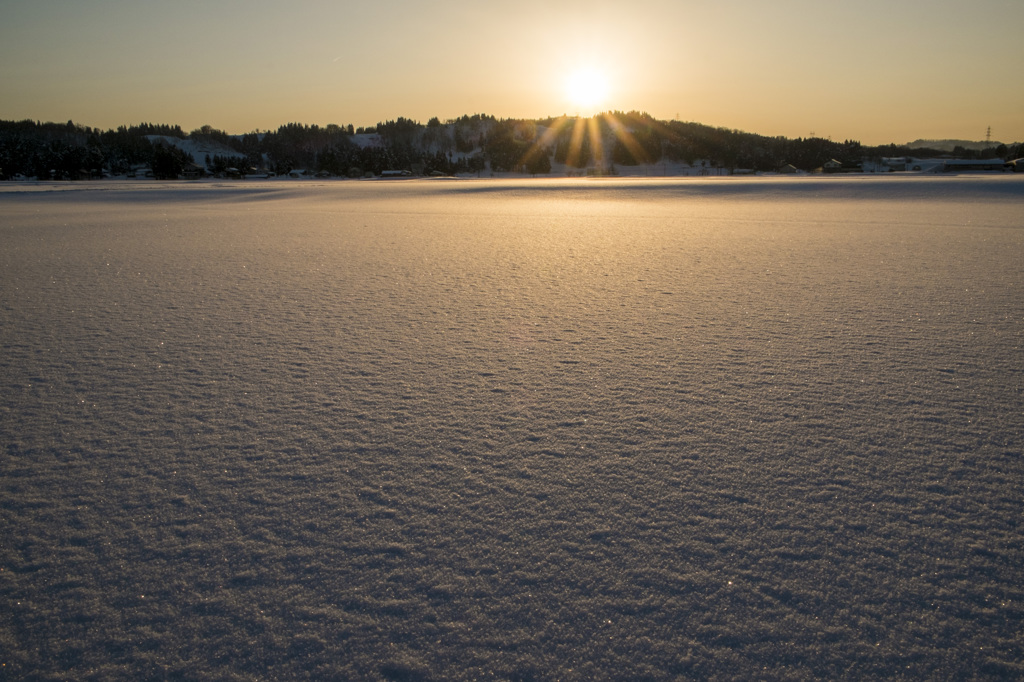 雪原の夕日