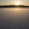 雪原の夕日