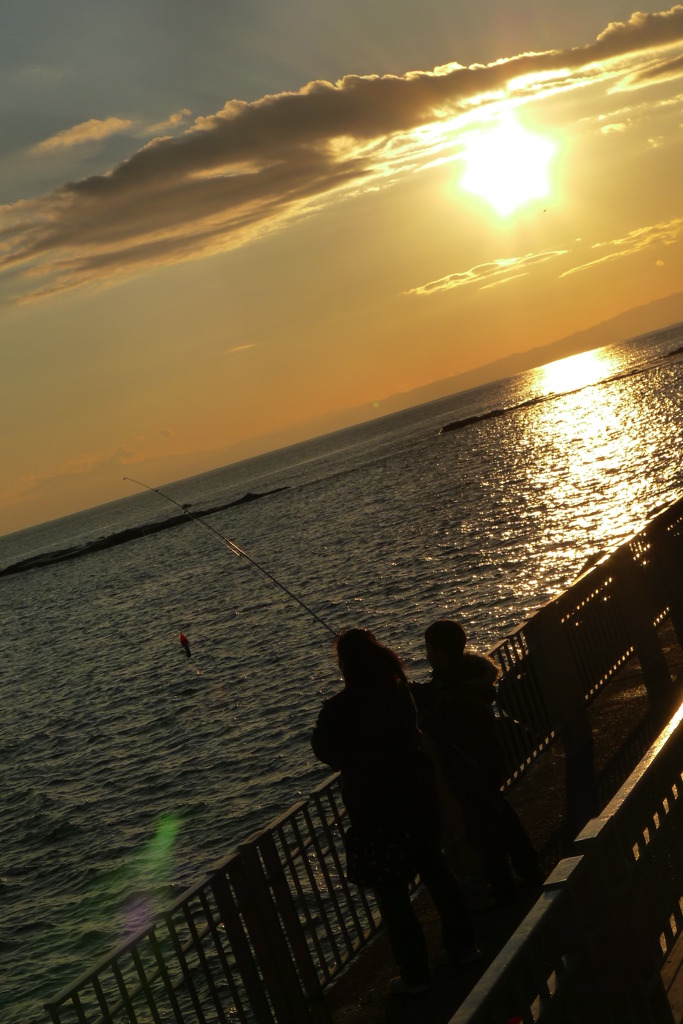 太陽と釣り人の親子