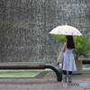 雨に佇む