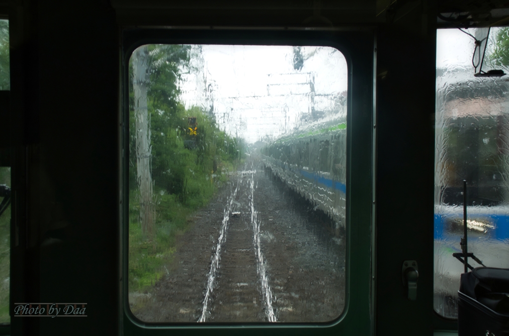 雨の中で