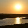 川と夕陽