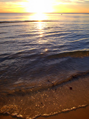 a sunset at a beach