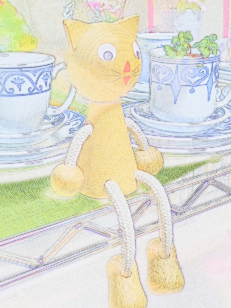 笑顔で座るネコ