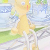 笑顔で座るネコ