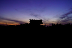夕陽に沈む神の社