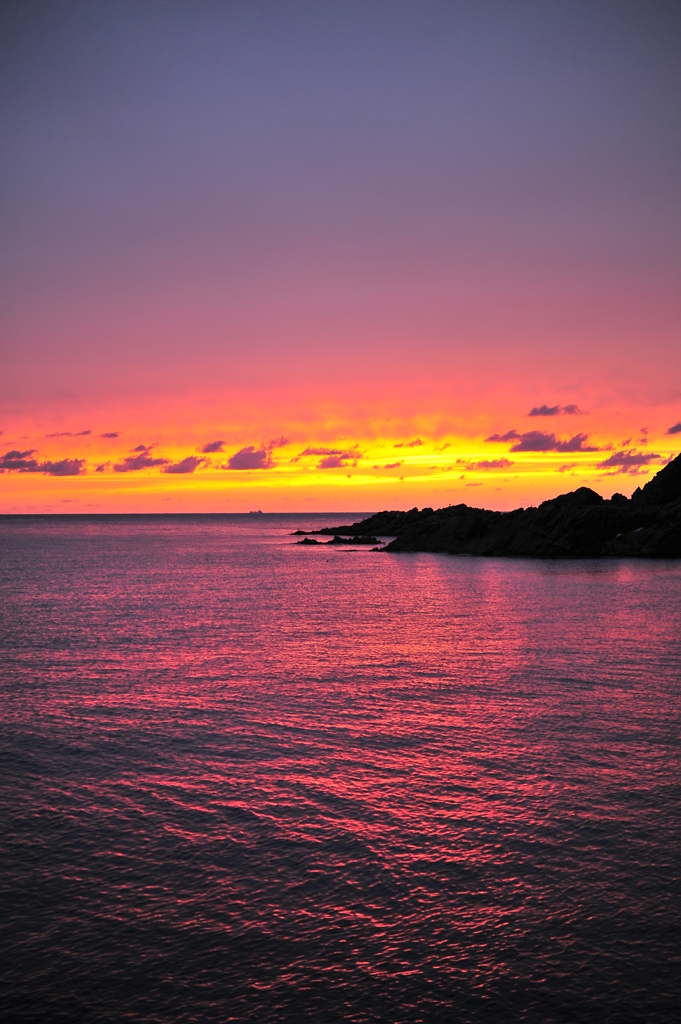 The flame sky purple sea
