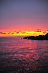 The flame sky purple sea