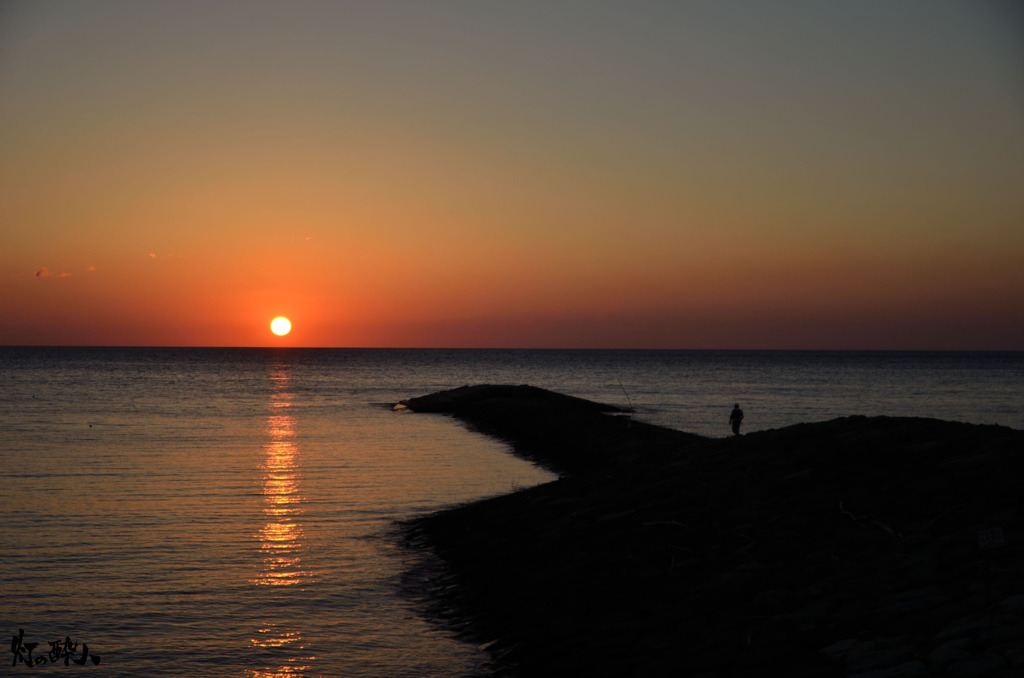 太陽と釣り人