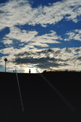 running under the autumn sky