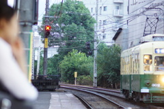 The woman waiting a streetcar.