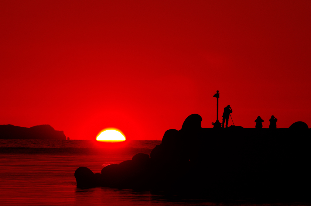 夕陽を撮る人