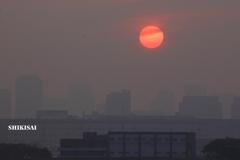黄砂と夕陽