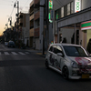 夕焼けに照らされる痛車