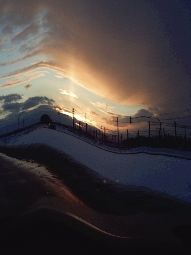 夕陽　ぐにゃり