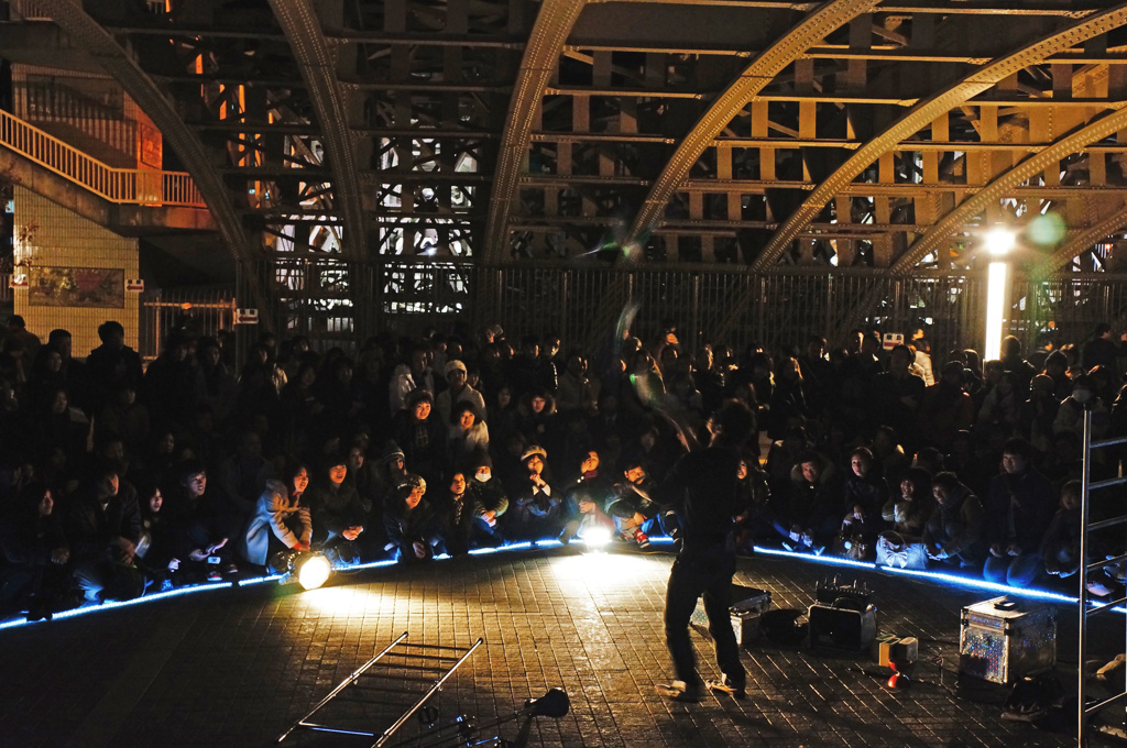 The juggler under a bridge