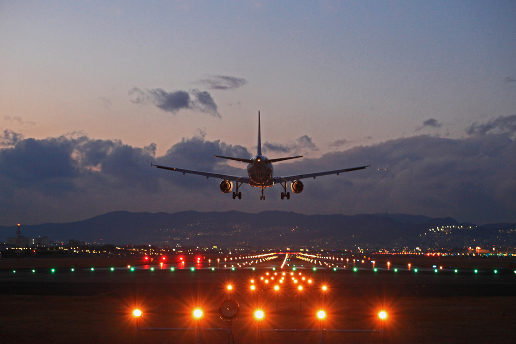 The plane was guided to the light