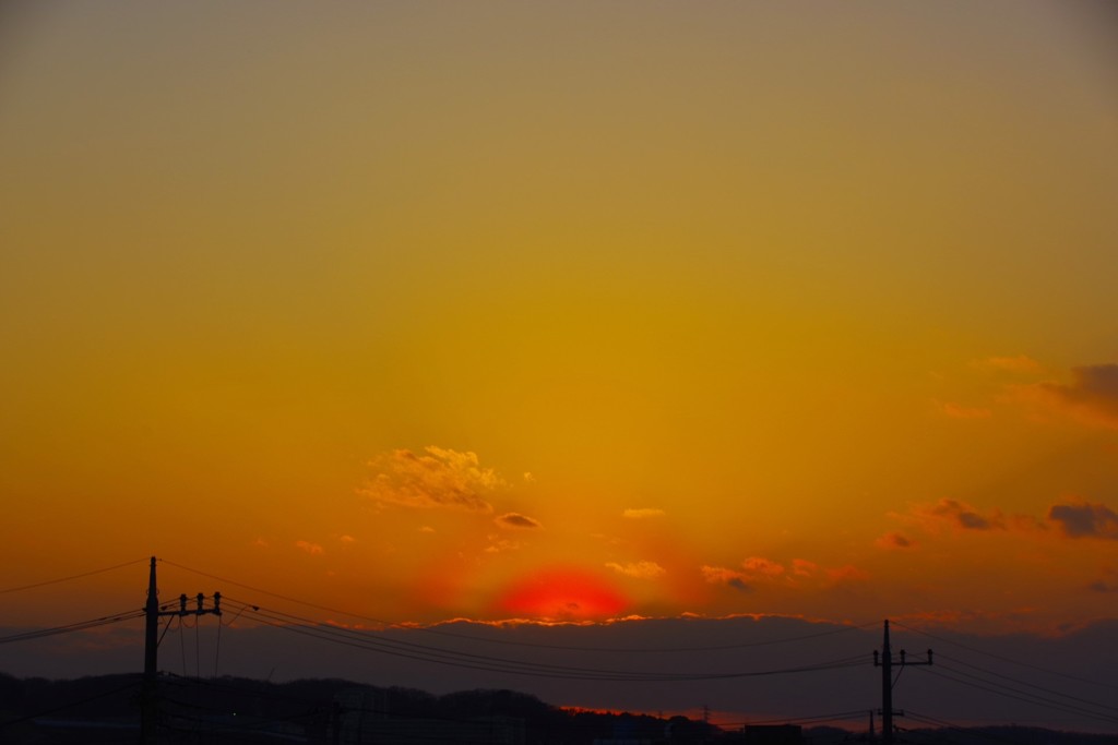 夕日の周囲に虹が！