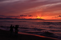 Photographer shooting sunset