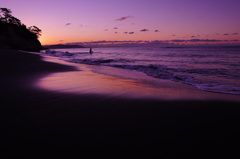 Surfing at sunrise