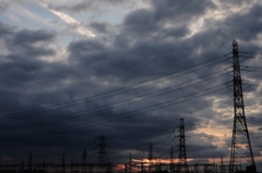 Cloud and steel tower