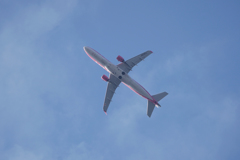 7034m