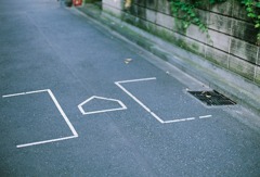 野球少年の影
