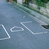 野球少年の影