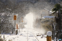 雪煙の中へ