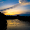 北上川に映える夕陽