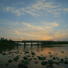 多摩川に夕日を映して