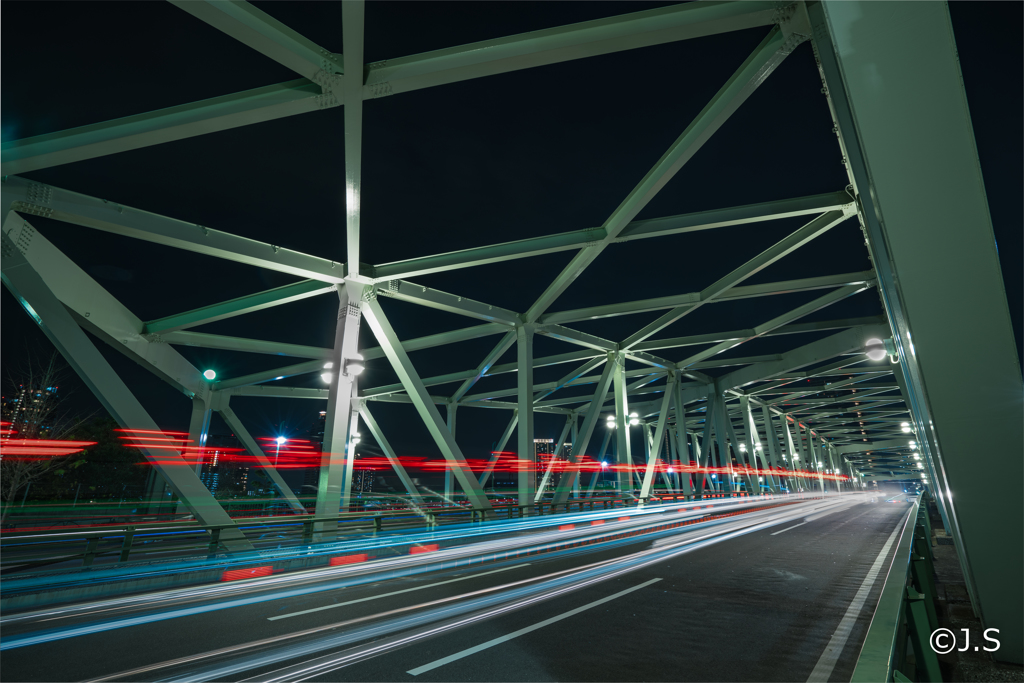 Lines by car light and bridge structure