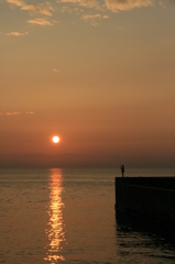 sunset fisherman