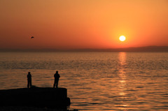 釣り人と夕日