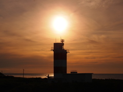 夕日と灯台