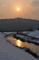 川面の夕陽