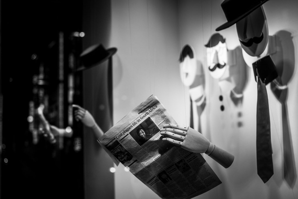 Reading newspaper 