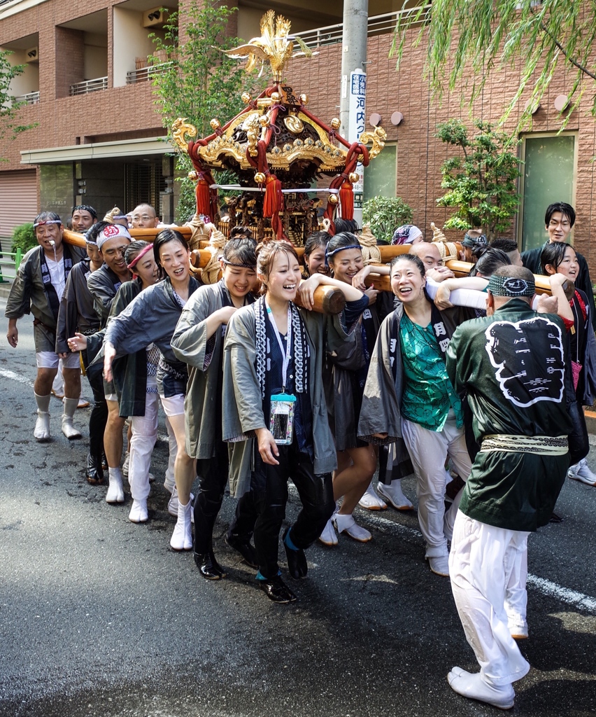 Carrying a portable shrine