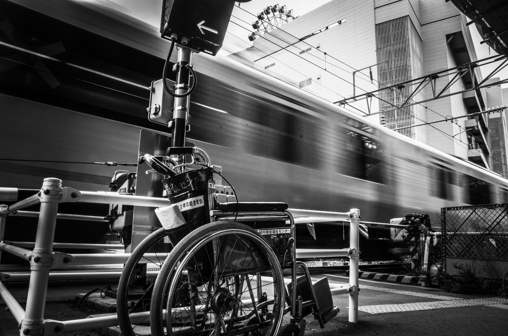 Wheelchair, running train & ferris wheel