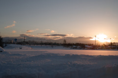 雪原と夕陽